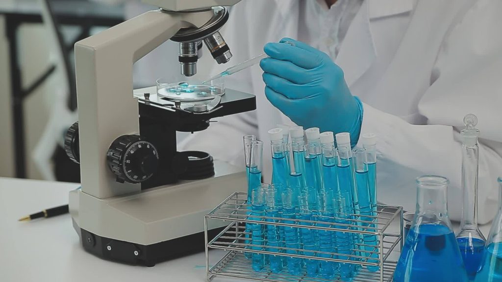 health-care-researchers-working-in-life-science-laboratory-young-female-research-scientist-and-senior-male-supervisor-preparing-and-analyzing-microscope-slides-in-research-lab-free-video