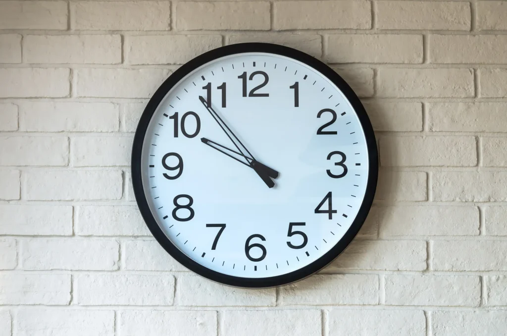 clock-on-brick-wall